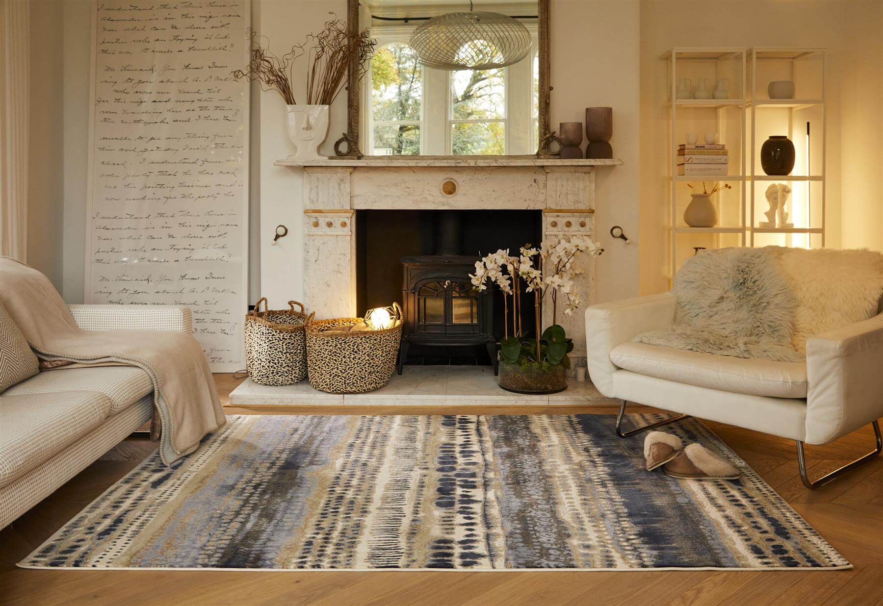 A batik multicolour abstract rectangular area rug with modern blue gray and beige patterns for living spaces