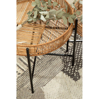 Batu set of 2 natural rattan round side tables with black cross base metal legs for stylish living spaces