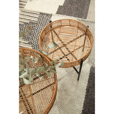 Batu set of 2 natural rattan round side tables with black cross base metal legs for stylish living spaces