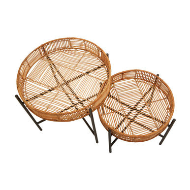 Two round natural rattan side tables with black cross base metal legs from the batu set of 2