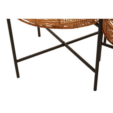 Woven wicker chair with black metal legs shown alongside batu set natural rattan side tables with cross base