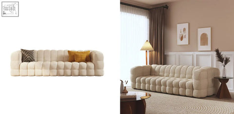 Cream-colored plush tufted bea beatrice sofa with modern segmented design and two decorative pillows seater sofa
