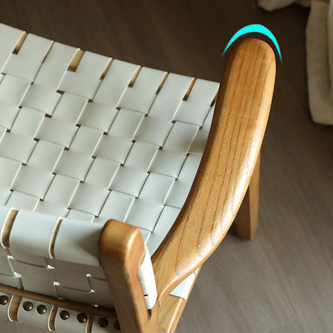 Modern dining chair with woven white leather seat and ash wood armrests perfect for stylish dining rooms