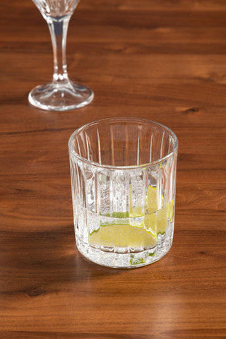 Clear ribbed glass from beaufort set of 4 crystal large tumblers with a lime wedge inside a large tumbler