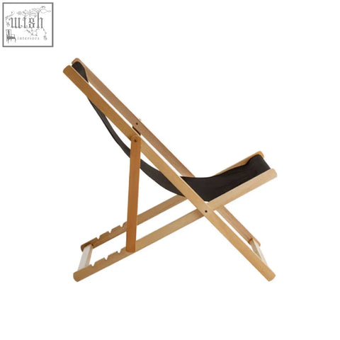 Beauport black deck chair with light wooden frame and black fabric sling seating perfect for outdoor deck use