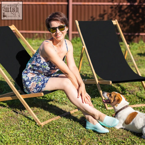 Light blue textured slip-on shoes shown on a black deck chair matching the beauport black deck chair style
