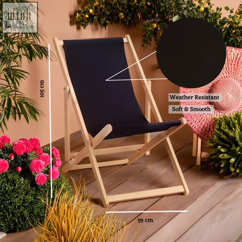 Beauport black deck chair in navy blue weather-resistant canvas with light wood frame perfect for outdoor use