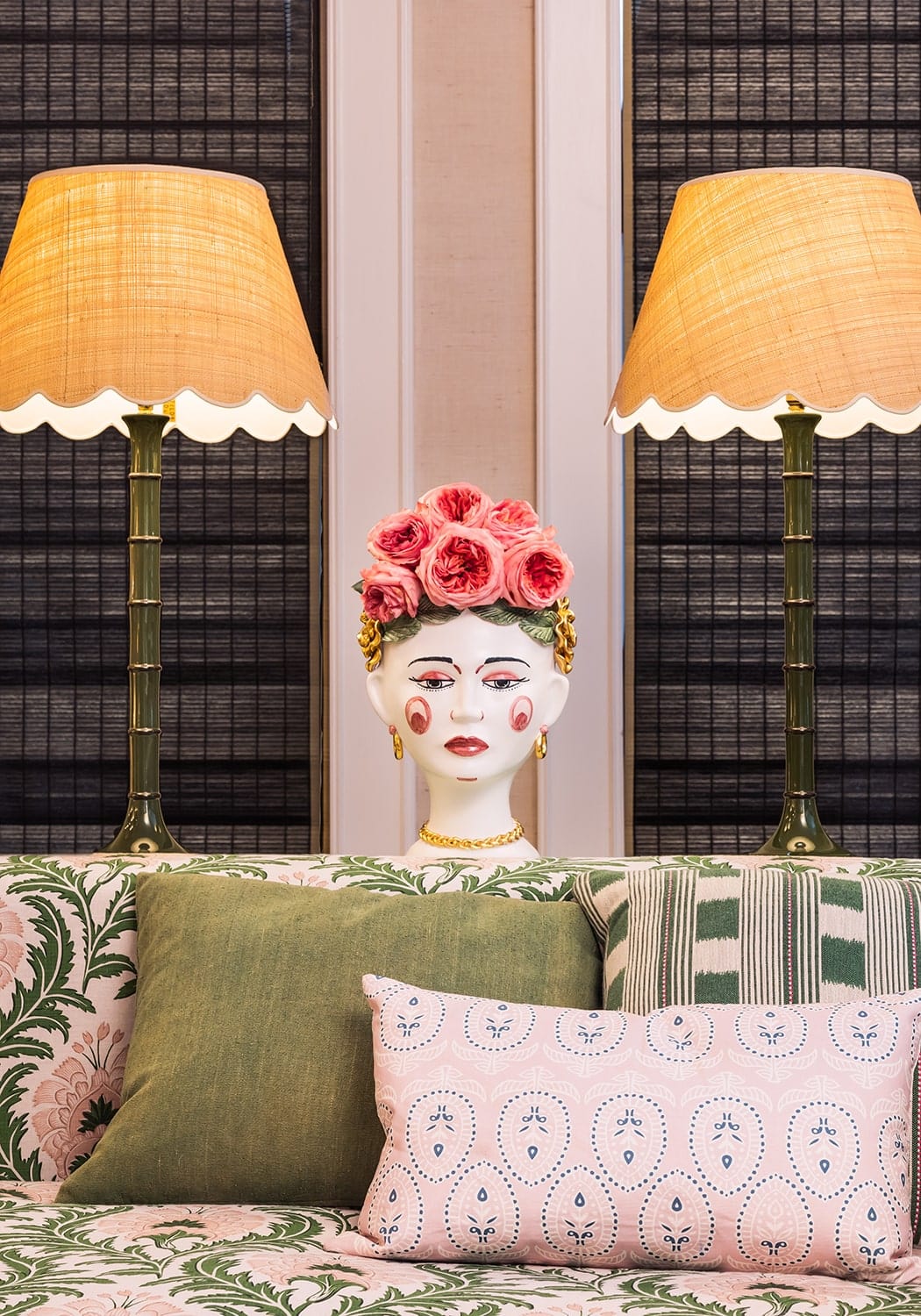 Beautifully sweet scallop lampshade featuring a frida kahlo-inspired ceramic head with pink roses and gold accents
