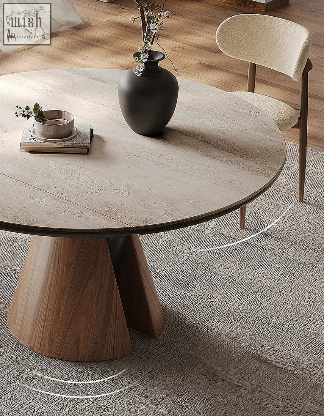 Becerra foldable round dining table with a light gray stone top and tapered wooden base perfect for round dining spaces