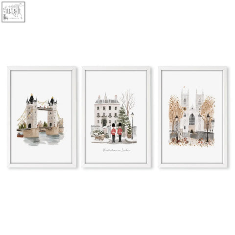 Set of three bedroom framed pictures with white frames featuring watercolor prints of london landmarks wintertime in london