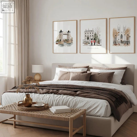 A gold-toned ceramic vase with dried flowers beside bedroom framed pictures wintertime in london travel prints set of 3