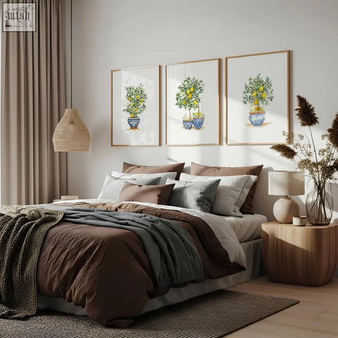 Three framed french country bedroom pictures of lemon tree prints in blue ceramic pots with light wood frames