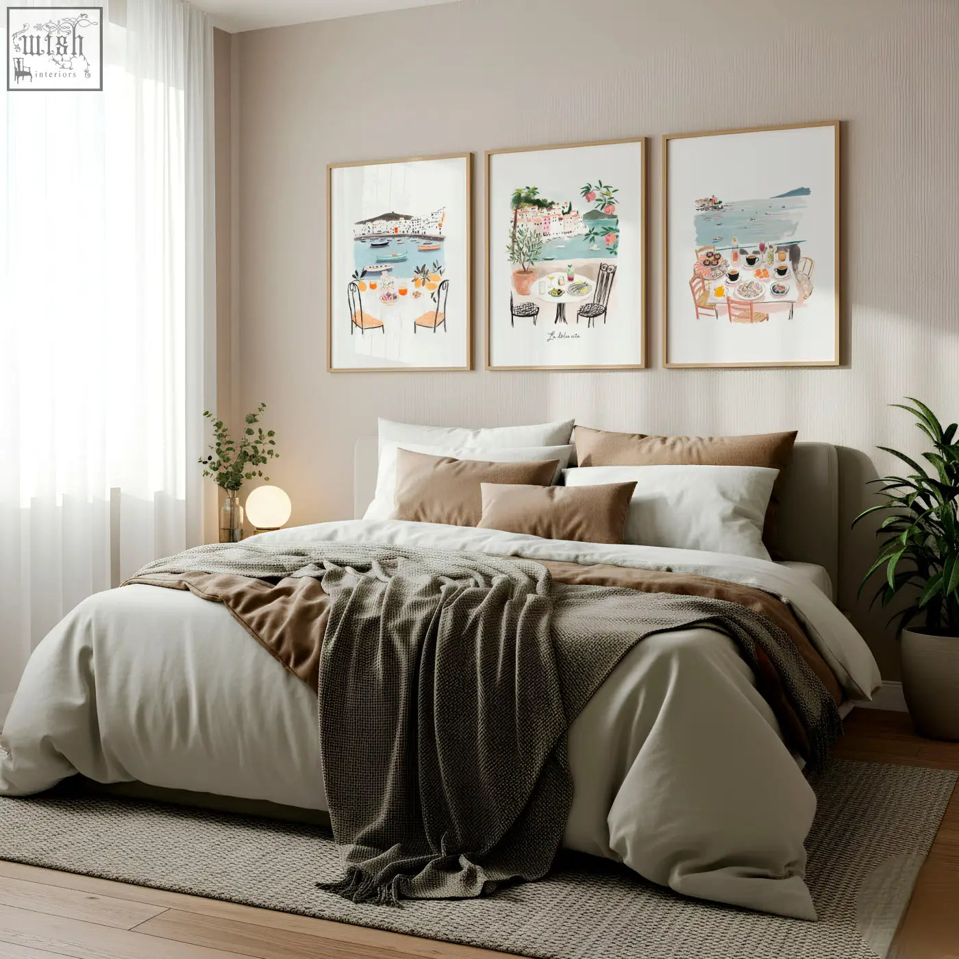 A cozy bed with soft beige and brown bedding and a dark green throw showcasing bedroom prints featuring dolce vita dining scene