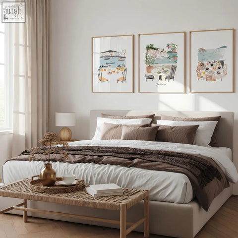 Beige upholstered bed with layered white and brown bedding in mediterranean coastal bedroom prints dining scene dolce vita set