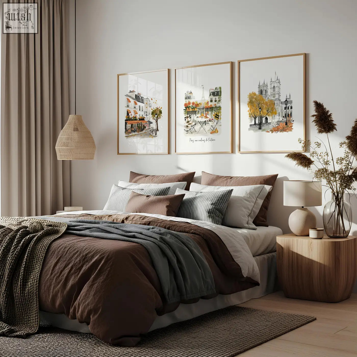 Three framed watercolor bedroom wall pictures of parisian autumn scenes hanging above the bed wall pictures