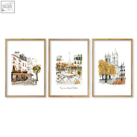 Set of three framed bedroom wall pictures with parisian autumn travel art in warm tones and light wood frames