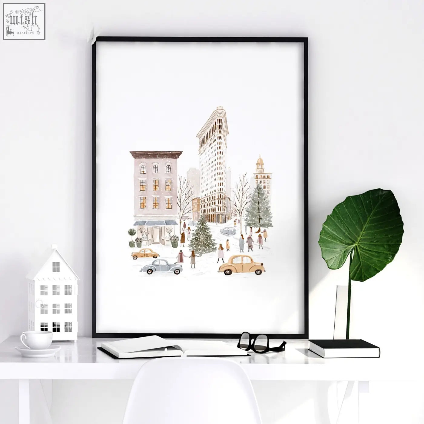 Black-framed bedroom wall prints of snowy new york cityscape with beige buildings vintage cars and winter people