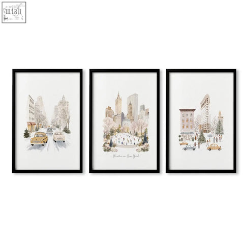 Set of three black-framed bedroom wall prints featuring snowy new york city watercolor scenes for bedroom wall decor