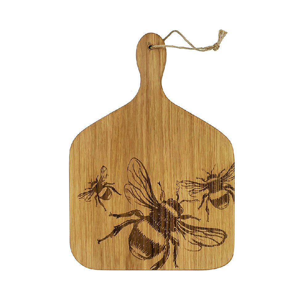 A light brown british oak hanging paddle with a laser-engraved bee design and natural wood grain with hanging loop