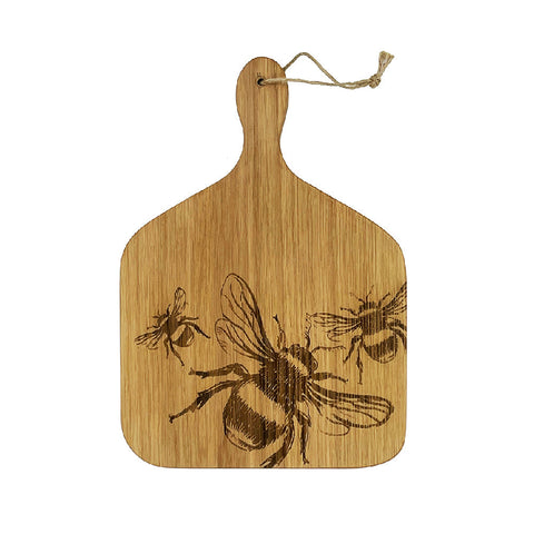 A light brown british oak hanging paddle with a laser-engraved bee design and natural wood grain with hanging loop