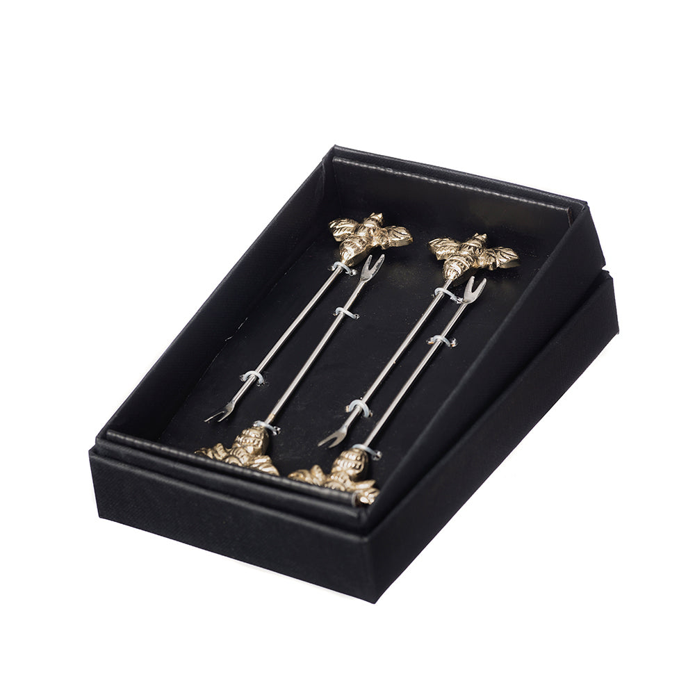 A set of 4 bee olive picks with ornate gold-toned bee tops and silver metal handles for stylish cocktail garnishes