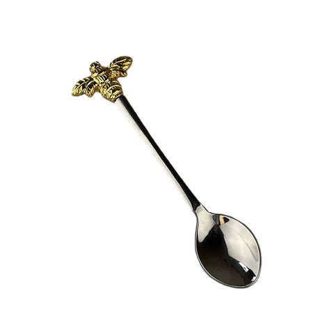 A shiny silver bee single spoon with a detailed golden bee figurine on the handle perfect for serving small treats