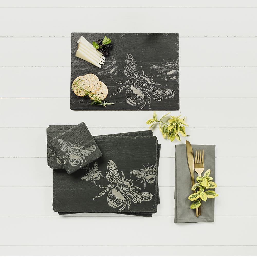 Dark gray slate place mats and coasters gift set featuring elegant white engraved bee designs set includes both pieces