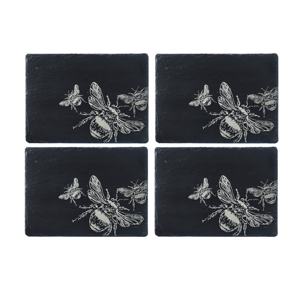 Set includes four black slate coasters with white engraved bee illustrations in bee slate placemat and coaster gift set
