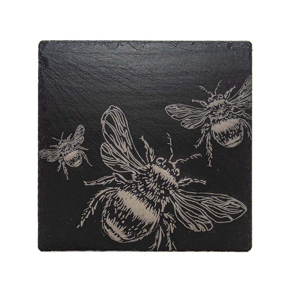 Black slate pot stand with intricately engraved light bees perfect as a stylish slate pot stand or coaster