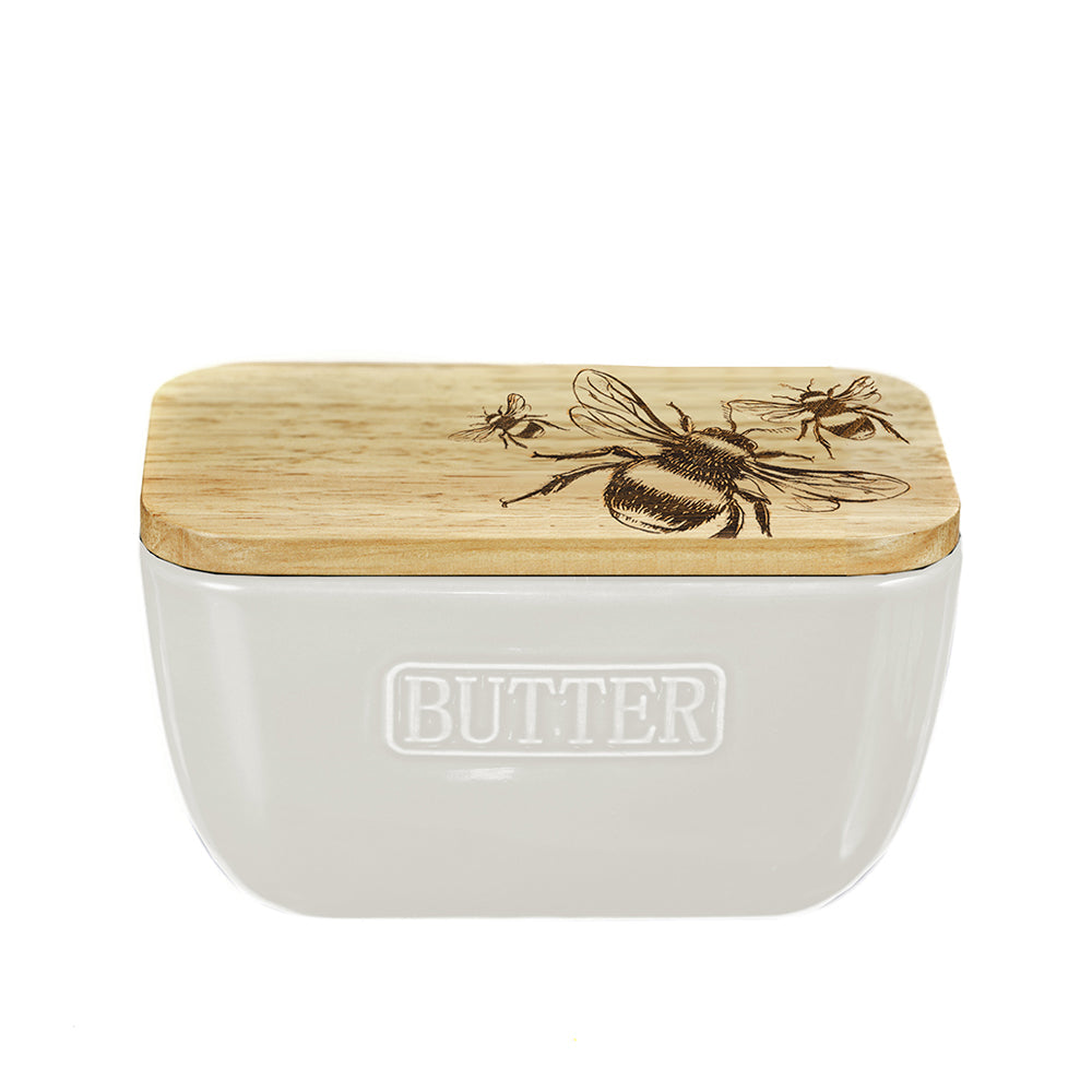 Cream-colored bee ceramic butter dish with natural wood lid engraved with bees for stylish kitchen use