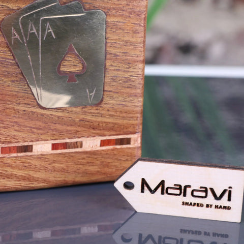 Handcrafted wooden playing card box with metallic spade motif and inlaid wood trim branded maravi for cards