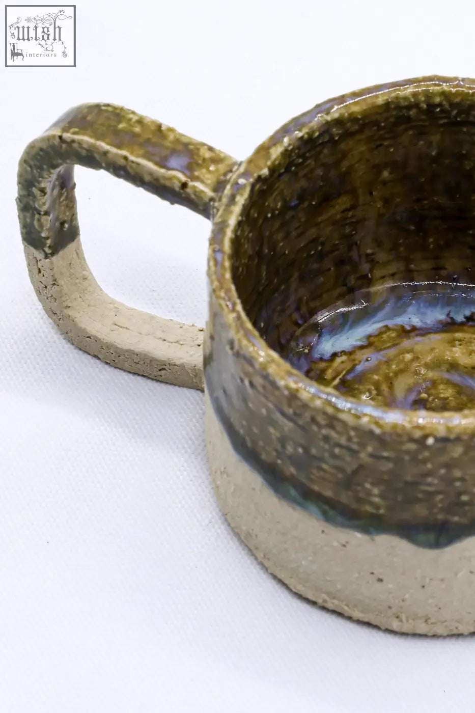 Beige grande handmade milled stoneware big ceramic mug with a rustic earthy finish and textured handle