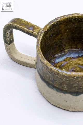 Beige grande handmade milled stoneware big ceramic mug with a rustic earthy finish and textured handle