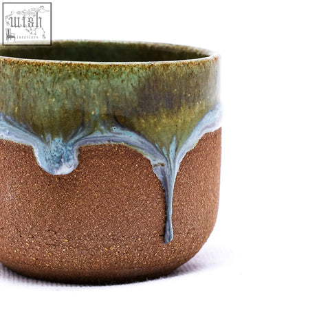 Beige picollo handmade ceramic espresso mug with rustic brown body and glossy blue green dripped glaze