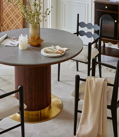 Bek round dining table with dark gray stone top fluted warm brown wooden base and polished gold foot round dining table