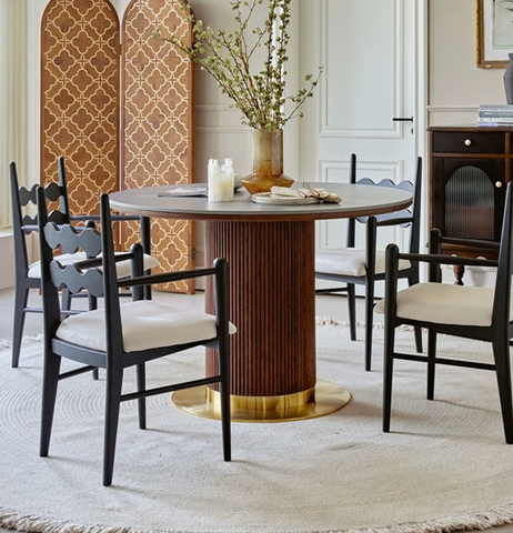 Brown bek round dining table with wooden top fluted pedestal and gold-toned round base perfect for round dining