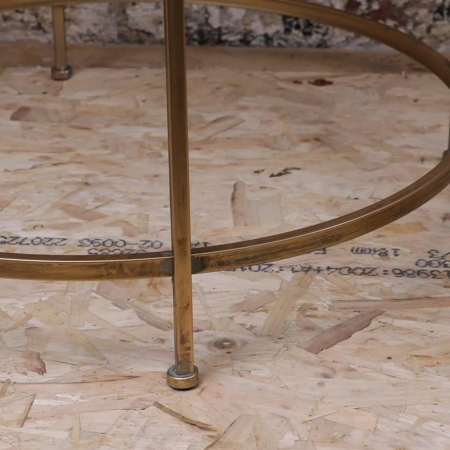 Brass-finished belagavi gold round metal coffee table with circular frame and slender legs perfect for side use
