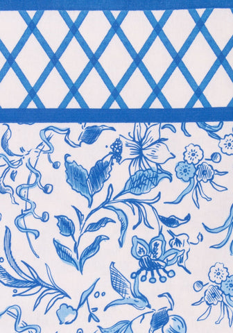 Blue and white patterned belgravia bloom cotton tablecloth with lattice border perfect for dining use