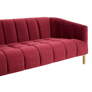 A plush deep red wine velvet sofa with tufted cushions and sleek modern design perfect for any living room