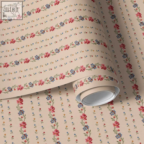A roll of belle buds blush wallpaper featuring vintage-style pink blue and green floral buds on a soft cream background