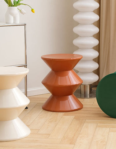 Glossy terracotta ceramic bennio dressing table stool with geometric tiered design perfect for your dressing table