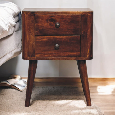 Dark brown bera bedside table with two drawers and rounded metal knobs made of solid mango wood