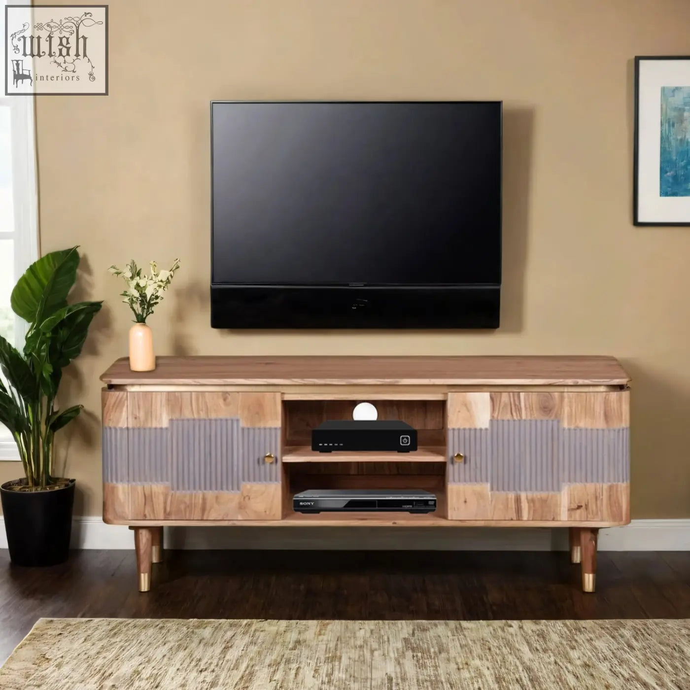 Modern berkley acacia wood tv unit with light wood grain, gray vertical panels, gold hardware, and lower storage compartments