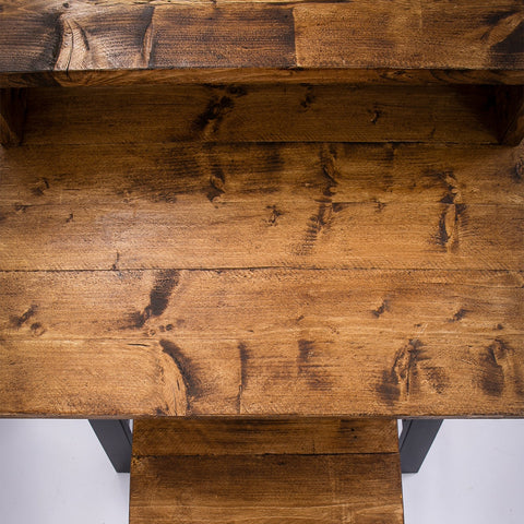 Rustic wooden shelf with warm natural finish and visible grain patterns for bespoke work from home desk furniture care kit