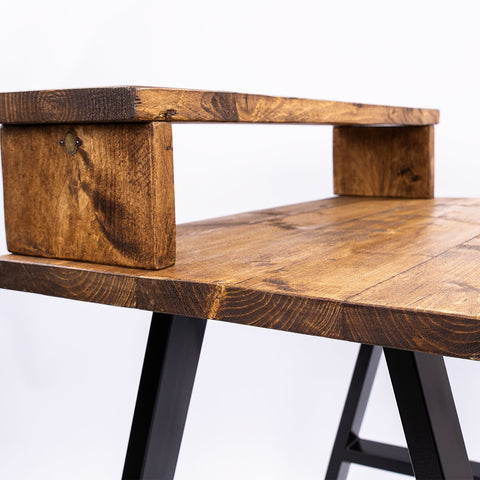 Rustic bespoke work from home desk with dark brown wood finish and black metal legs ideal for furniture care kits