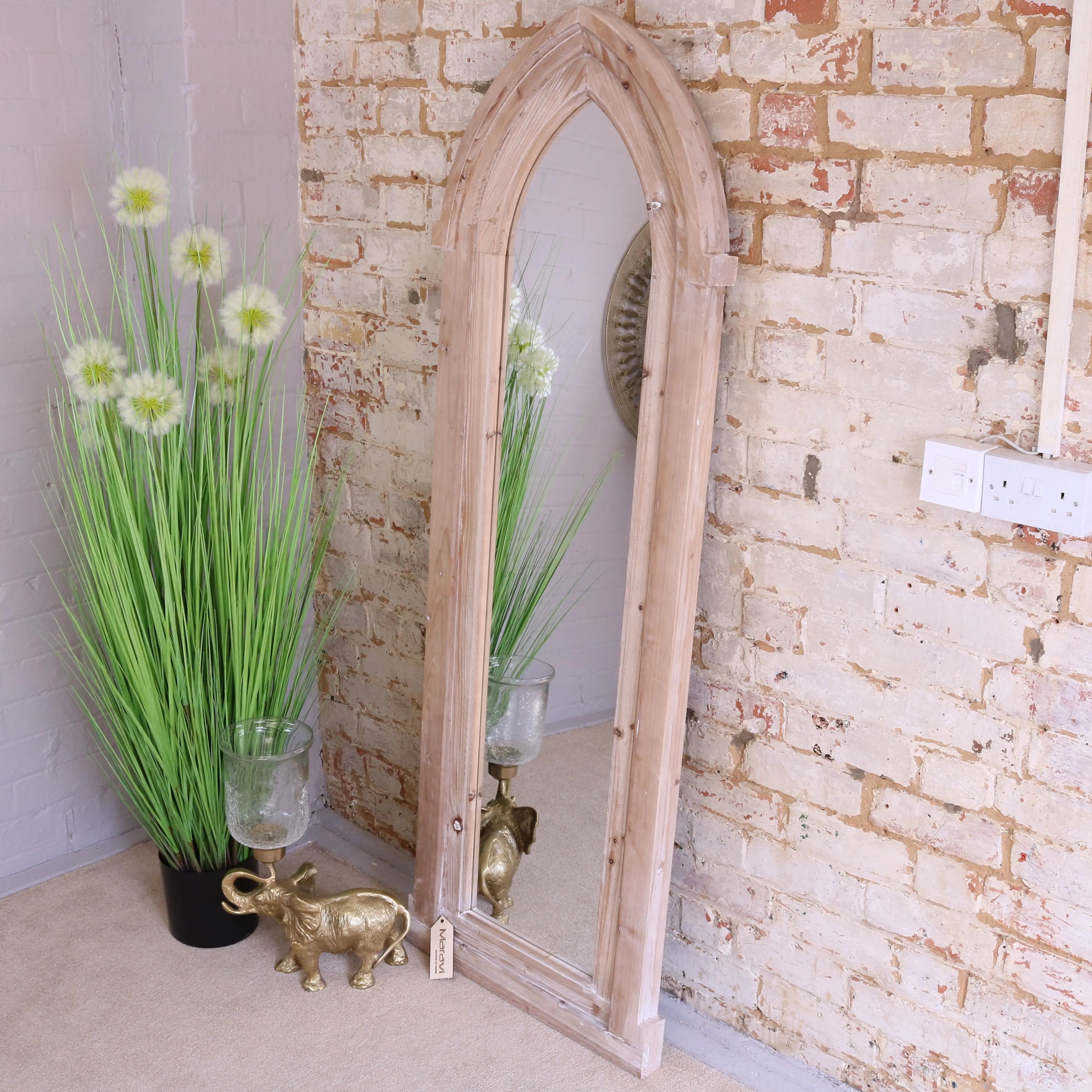 Betul full size wooden arch mirror with a tall rustic wooden arch frame and visible wood grain finish