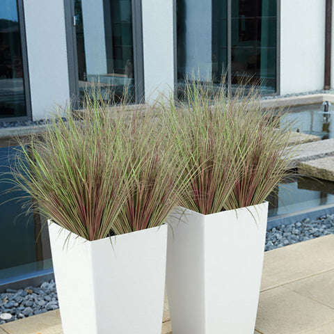 Two tall white rectangular planters with lush green and reddish-brown artificial wheat grass faux plants for indoor outdoor use
