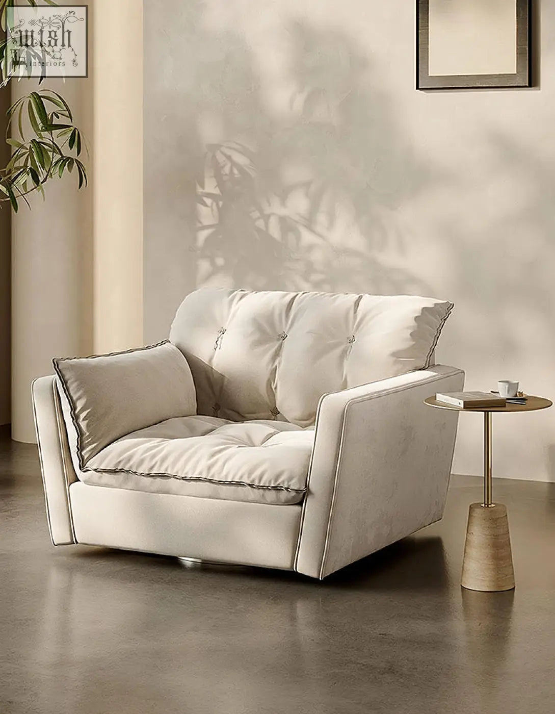 Cream-colored velvet bhatia swivel snuggle chair with tufted cushions and dark stitching on beige swivel armchair