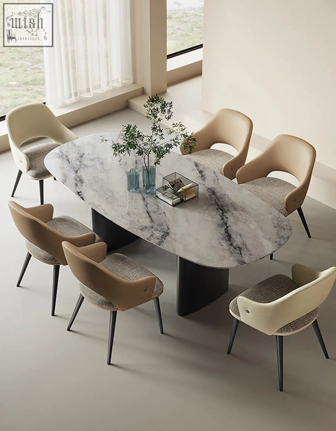 Modern oval dining table with white marble top gray veining and black pedestal legs paired with bianchi leather dining chairs offer style for your dining room