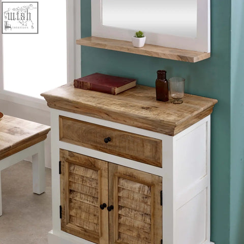 White cabinet with rustic wooden top and louvered doors featuring a drawer made of bianco solid mango wood
